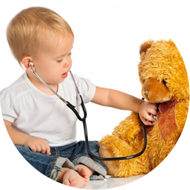 A child is playing with a teddy bear.