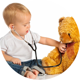 A child is playing with a teddy bear.